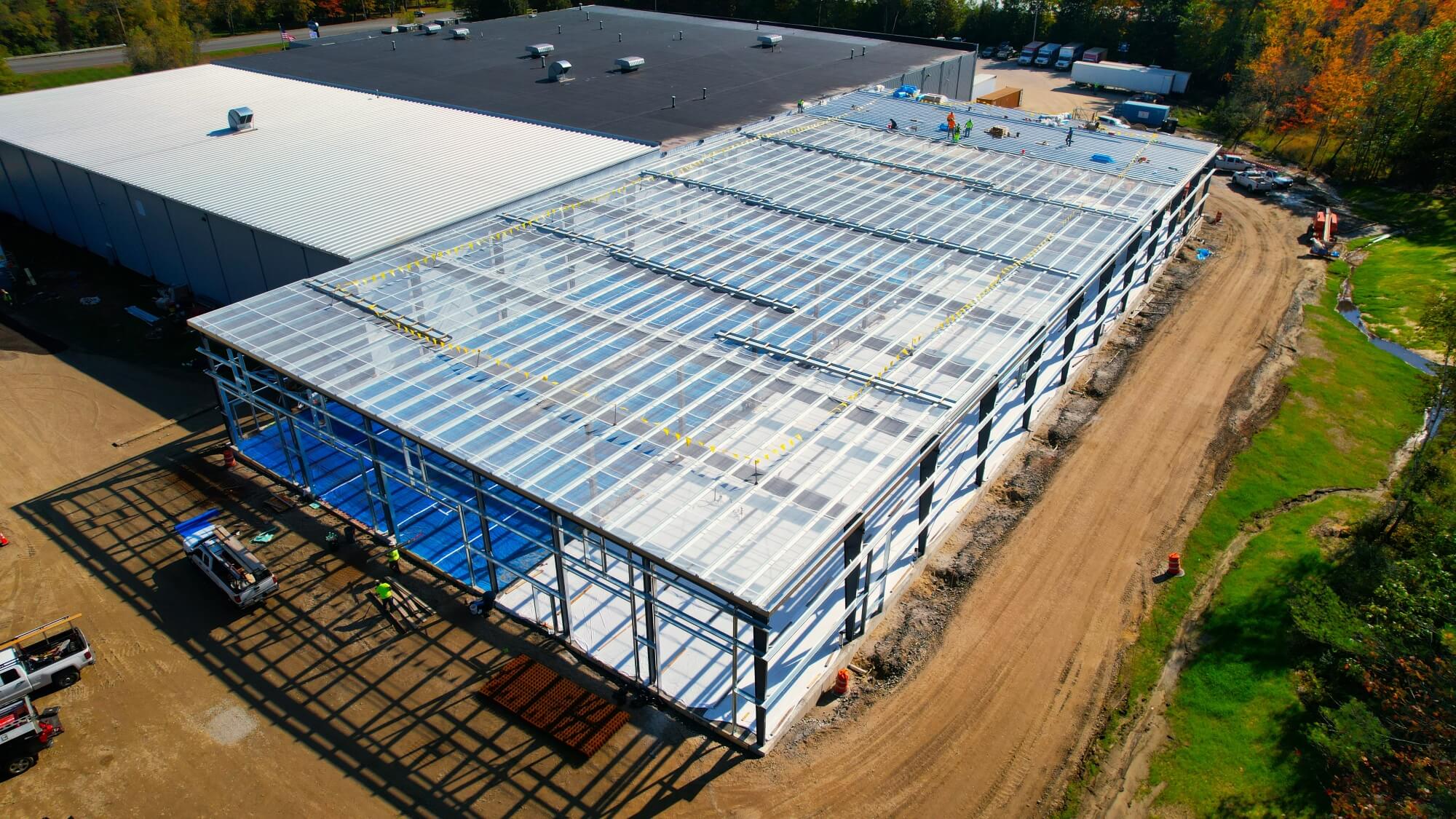 Later in the design / build process featuring a beverage distribution warehouse showing the pre-engineered metal building frame.