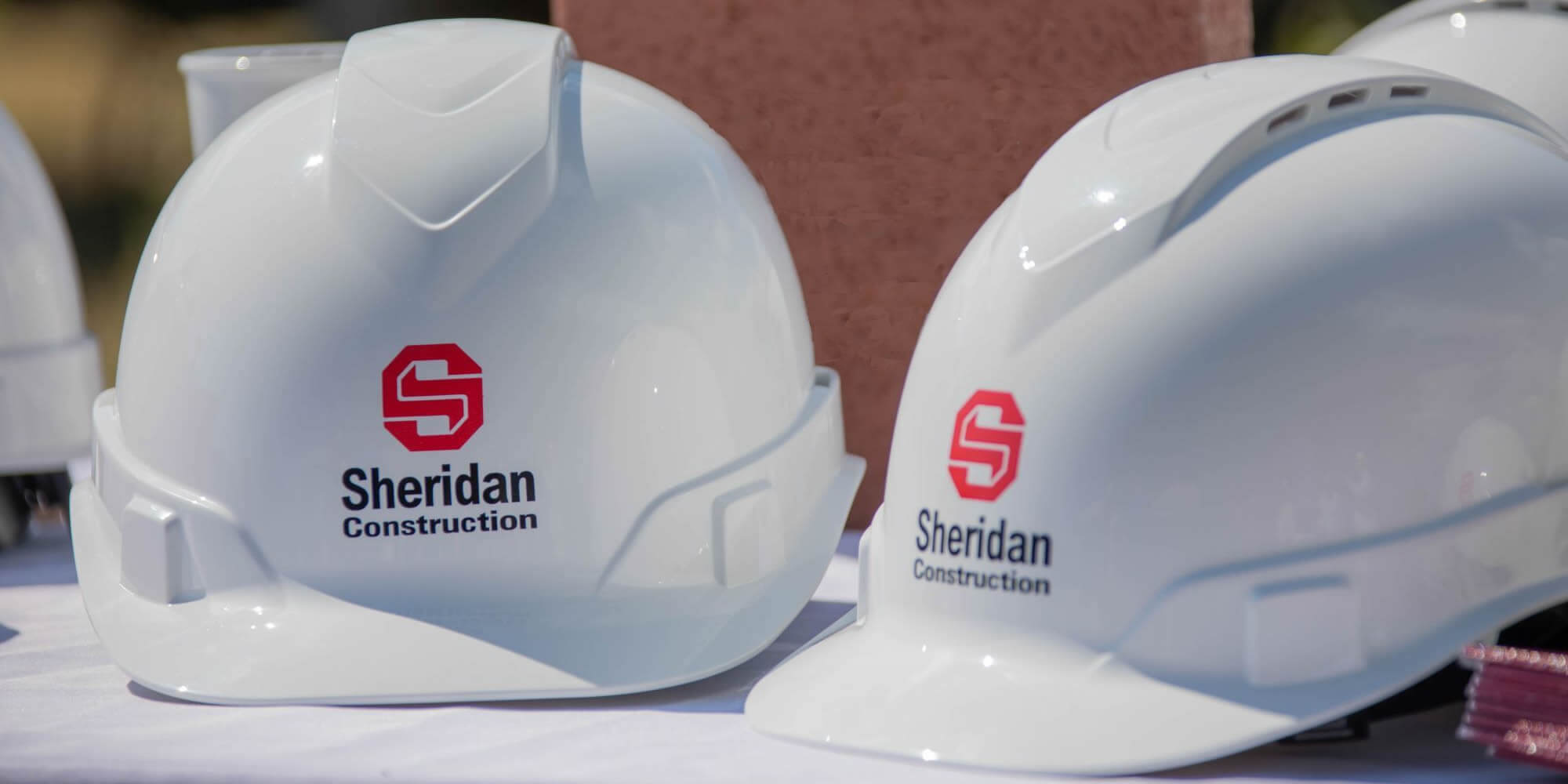 Sheridan Construction hard hats.