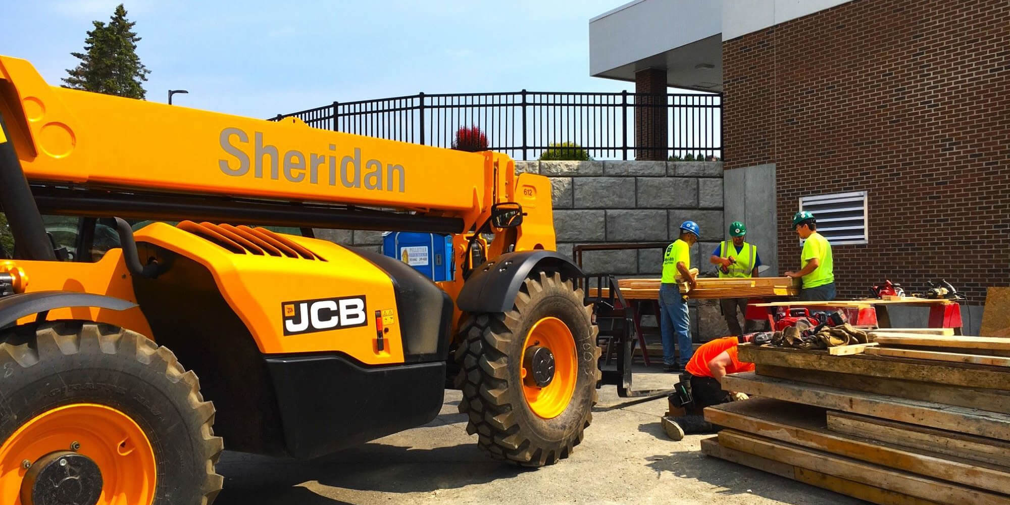 Sheridan construction crew at work implementing construction design.